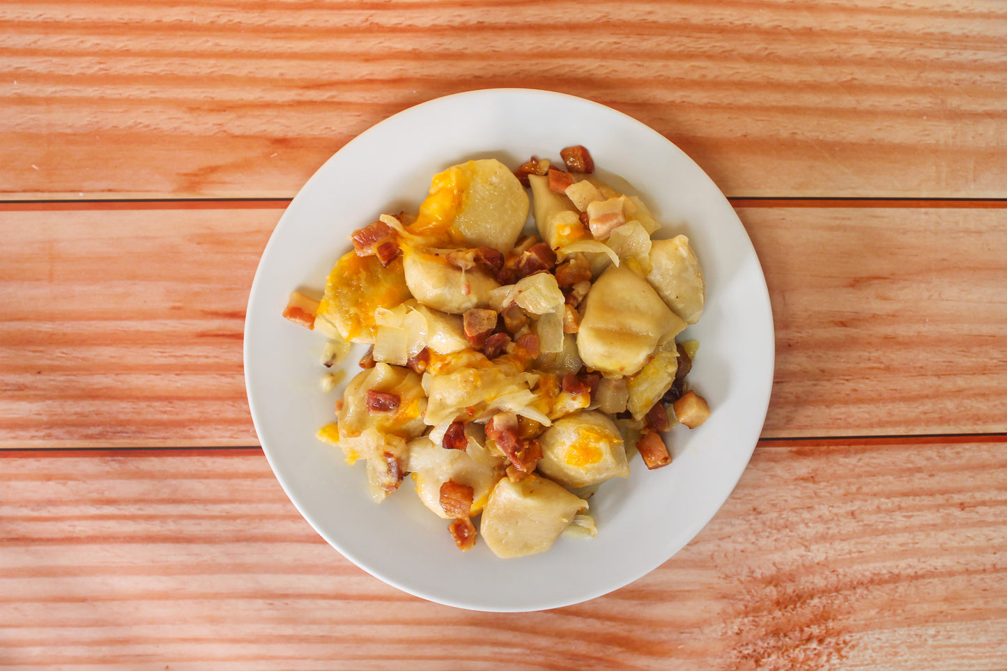 Potato & Cheddar Pierogi with Bacon & Onion